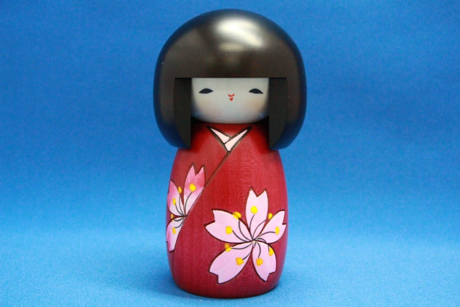 A popular souvenir from Japan! [Made in Japan] Folk craft, handcrafted item: Kokeshi doll by Usaburo, featuring cherry blossoms (small size).