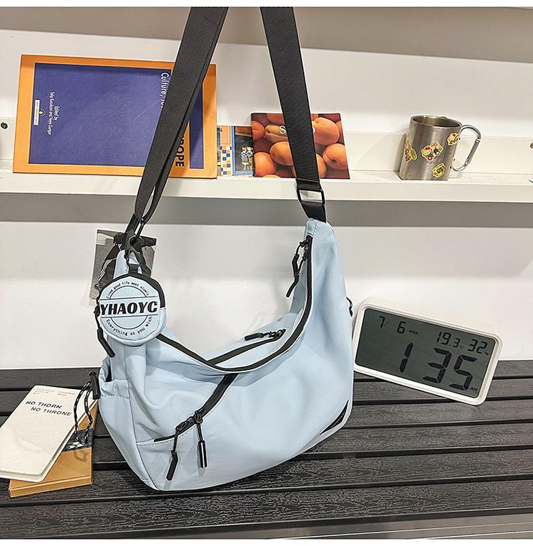 School bag couple messenger bag casual large capacity trendy brand dumpling bag versatile tooling shoulder bag sports lazy wind niche bag