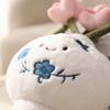 Blue and Porcelain Plush Toy with Removable Flower Bouquet
