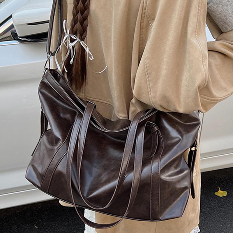Retro high-value bag large-capacity women's bag 2025 autumn new shoulder tote bag simple commuter armpit bag