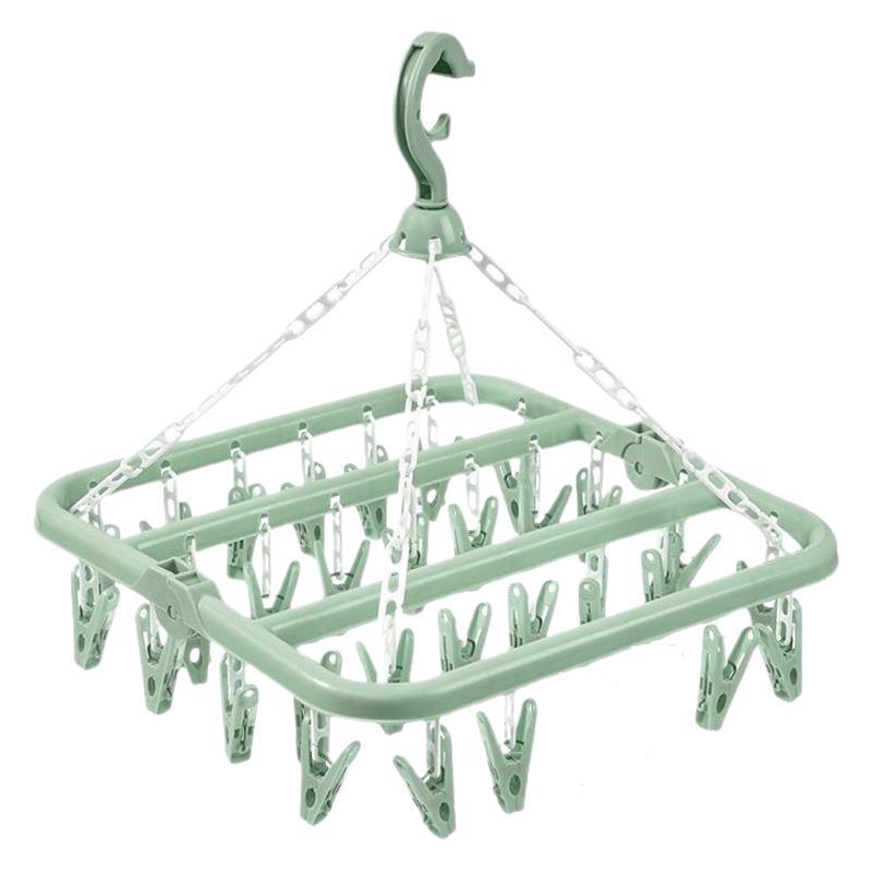Retractable Indoor Multi-Clip Clothes Drying Rack for Socks, Underwear, and Travel.