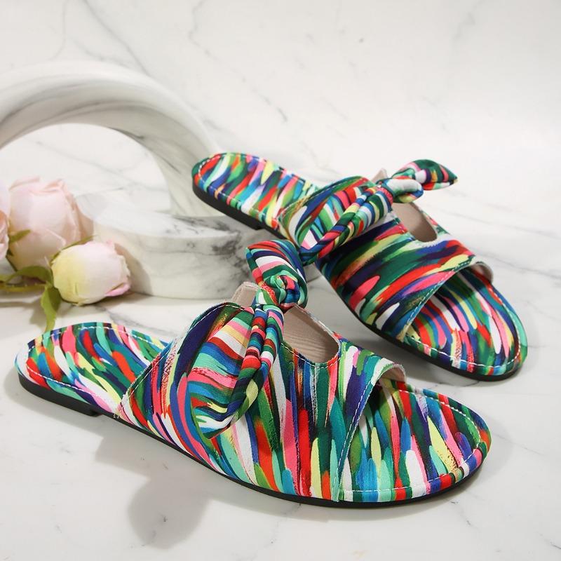 

Summer new flat-bottomed rainbow color round head one-word women s large-size cool slippers 36