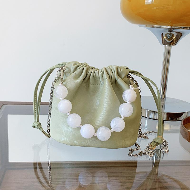 

Niche Fashionable Pearl Handheld Bucket Bag для женщин Новая летняя модная сумка через плечо с цепочкой