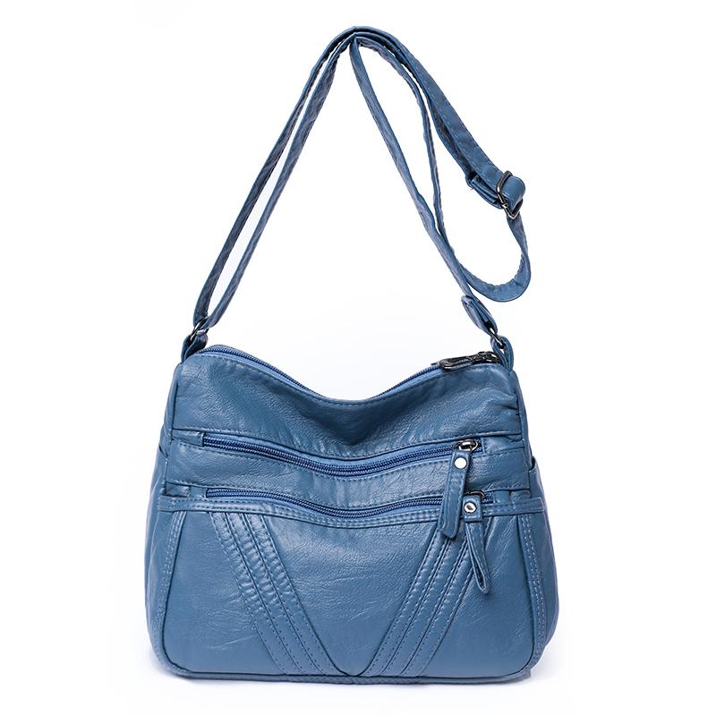Damska skórzana torba dla matki w średnim wieku. Torba na ramię typu crossbody. Torba z wieloma kieszeniami