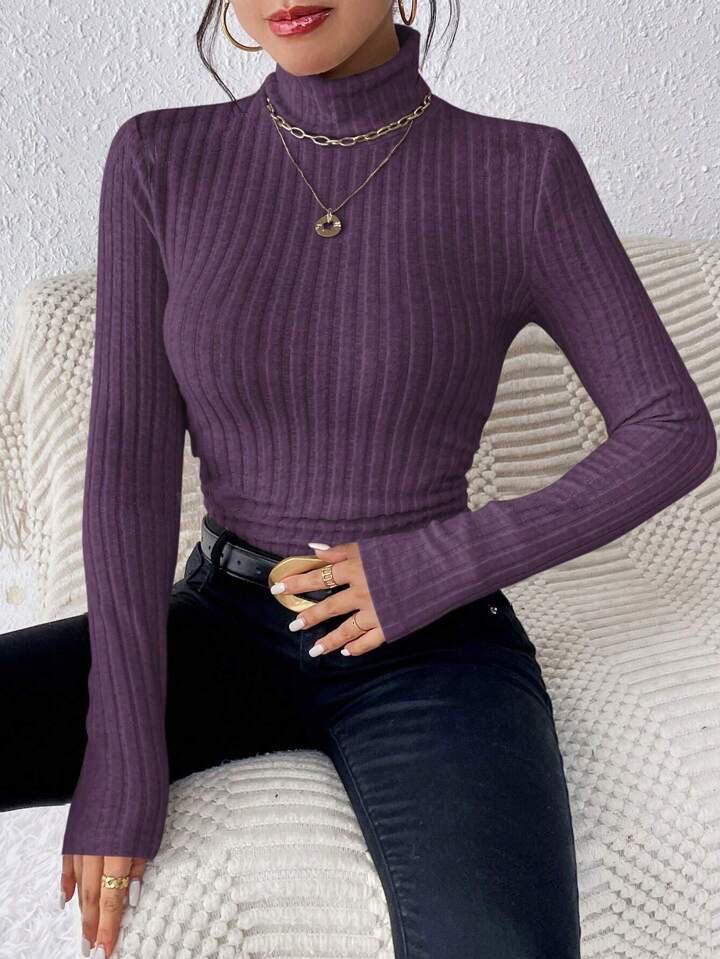 Disponibile: T-shirt a coste a maniche lunghe con scollo a V e collo alto Autunno/Inverno 2025