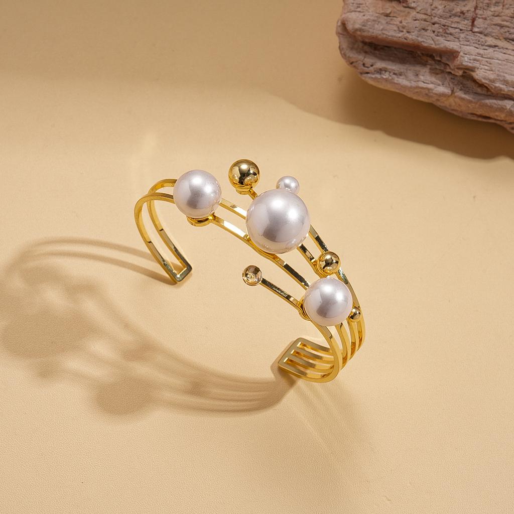 European and American metal sense imitation pearl geometry multi-layer hollow opening bracelet retro elegant jewelry 