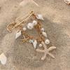 European and American ins ocean micro-inlaid pearl starfish brooch, niche conch fringed pin trouser chain multi-purpose clothing
