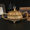 A metal fruit basket with handle, European style large food, snacks, candy storage tray, exquisite craft tableware.