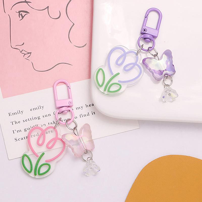 Akrylový barevný průhledný přívěsek na klíče s květinou v ins stylu, ozdoba na tašku