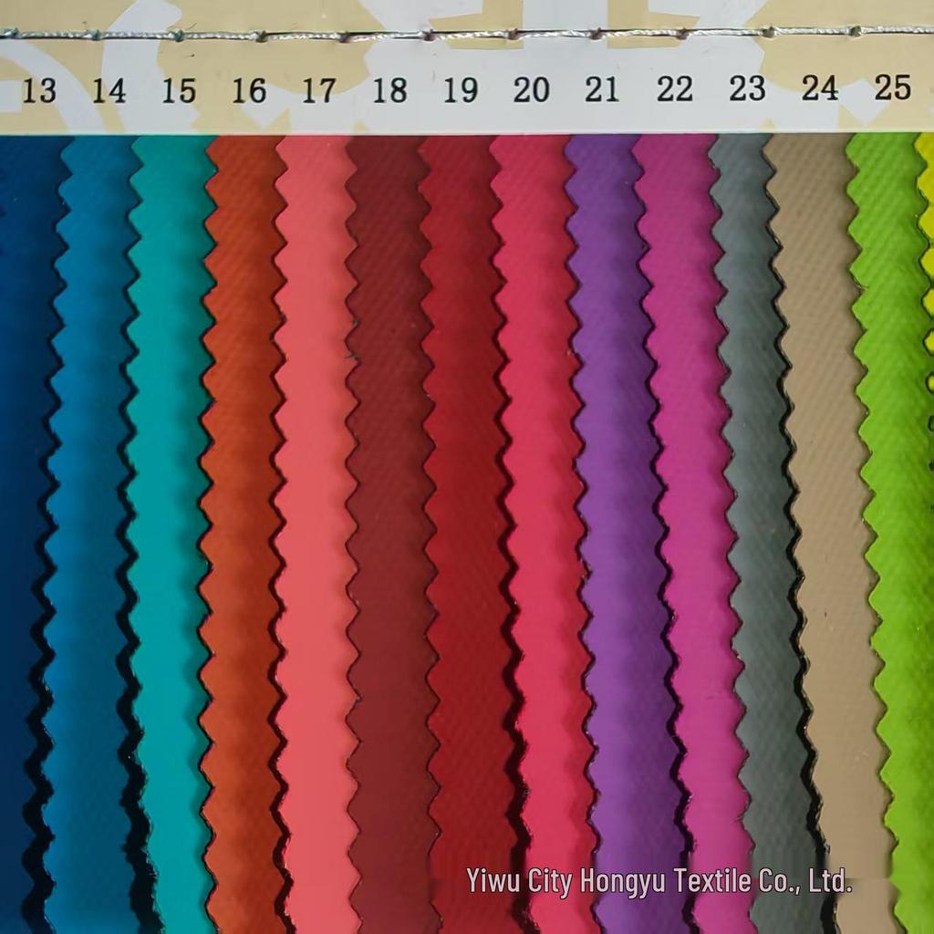 In-Stock Eco-Friendly Outdoor Bag Fabric: 600D Oxford Cloth with Release Paper Film Glue for Luggage and Handbags.