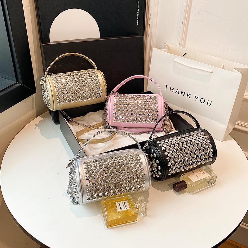 This year's popular bag ladies 2025 new Korean version fashion rivet personality trend hand-held crossbody cylinder bag PU