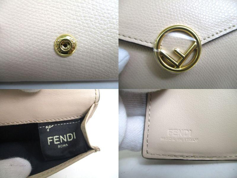 Оригинальный кошелек FENDI F IS FENDI FF бежевого цвета из кожи золотого цвета H/W Micro Trifold #a137, восстановленный