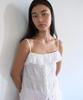 Manggomaenipeullijeu Dasha Frill Sleeveless_Ivory