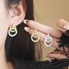 Silver Needle Elegant Chinese Style Gold Stud Earrings - High-End Luxury, Versatile Design for Women.
