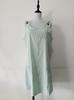 European and American coats new round neck pockets striped straps button casual dress