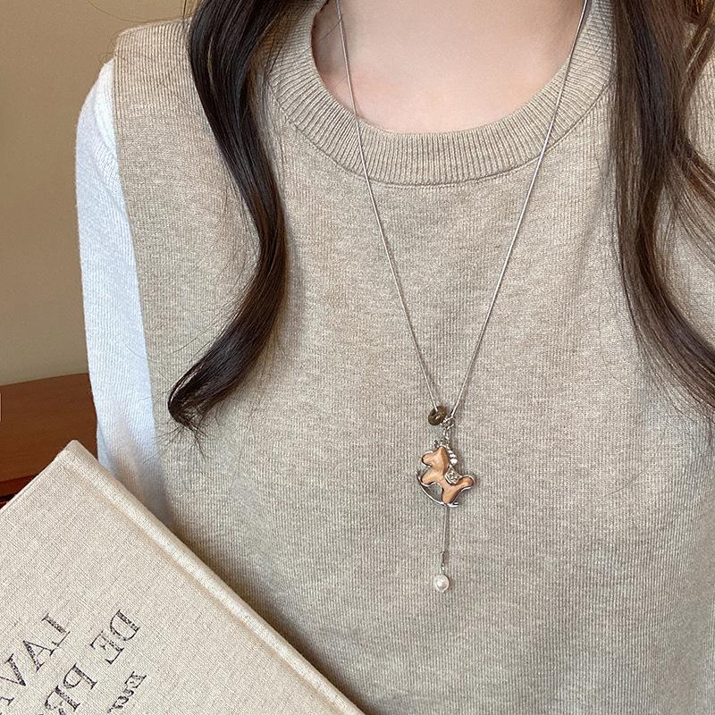 Cartoon Trojan horse pendant necklace women's 2025 new autumn and winter long sweater chain retro natal year good luck accessories