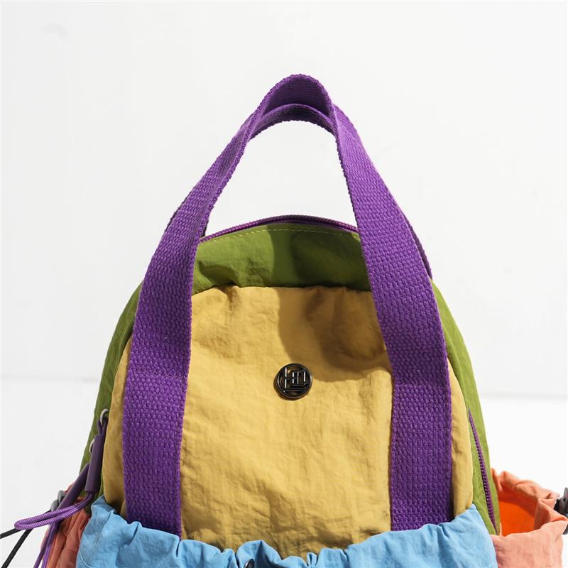 Color Block Backpack with Front Drawstring Pocket and Dual Carrying Options