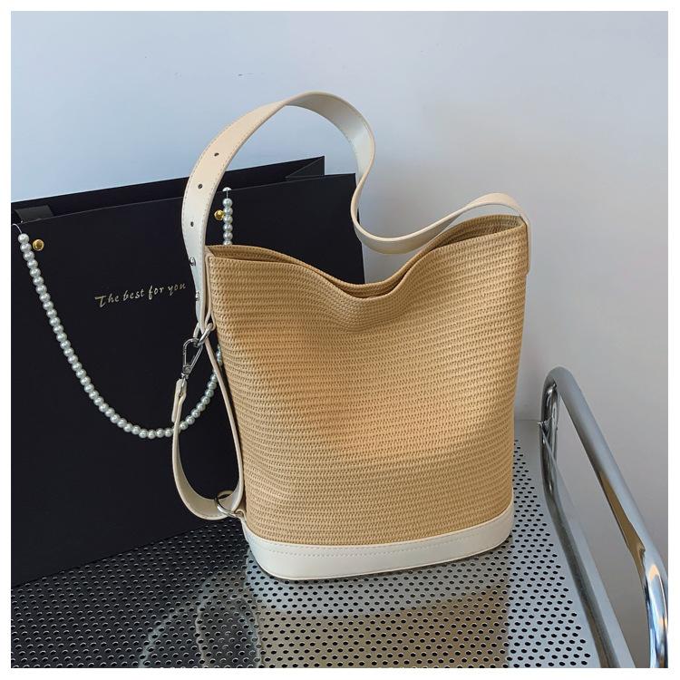 

2025 spring and summer new woven women s bag shoulder bag backpack handbag lunch box bag small handbag