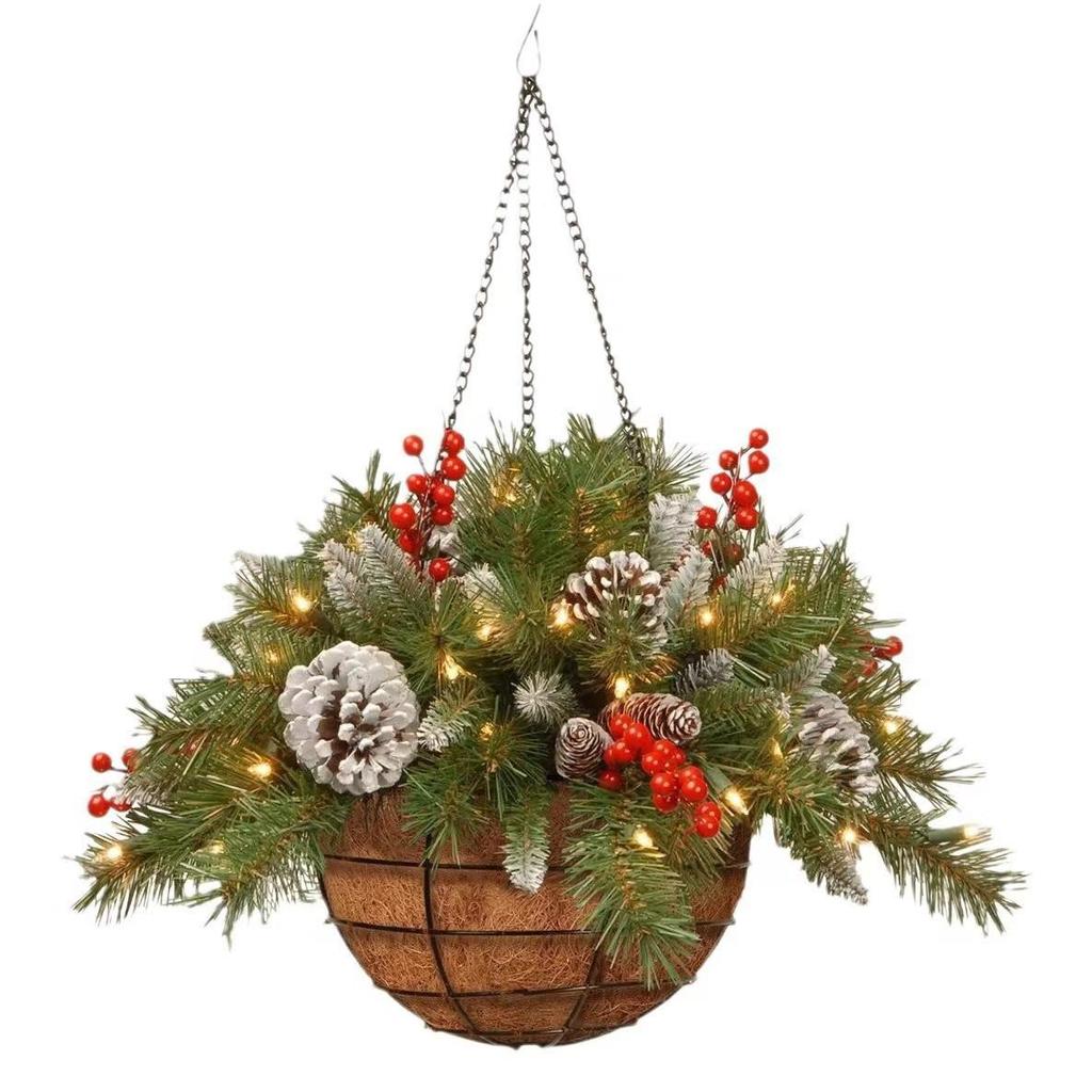 Grenzüberschreitender Weihnachtskranz aus Tannenzapfen und Beeren als Türschmuck