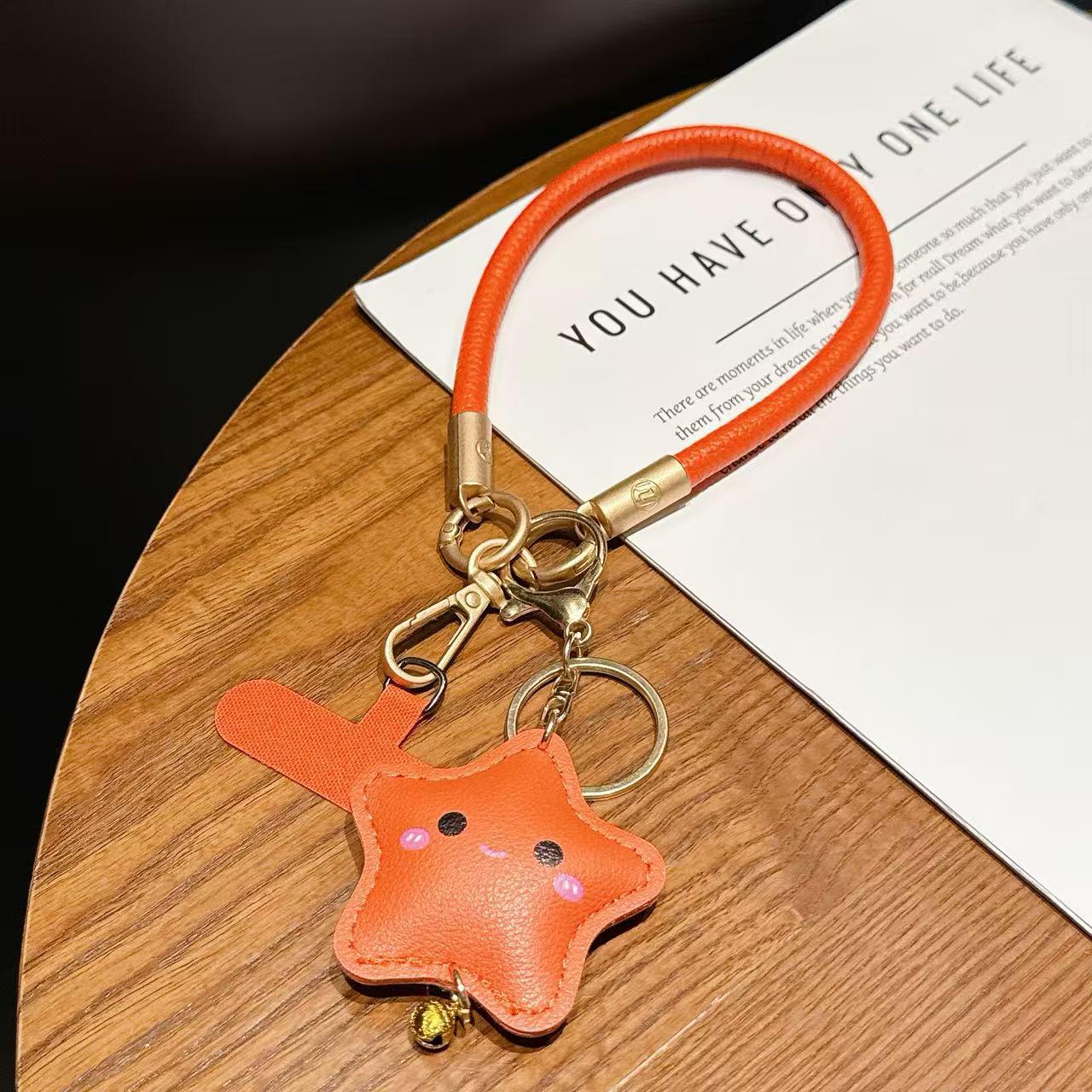 

Creative Star Charm Phone Lanyard: Wristlet with Bell Pendant and Anti-Lost Handheld Chain