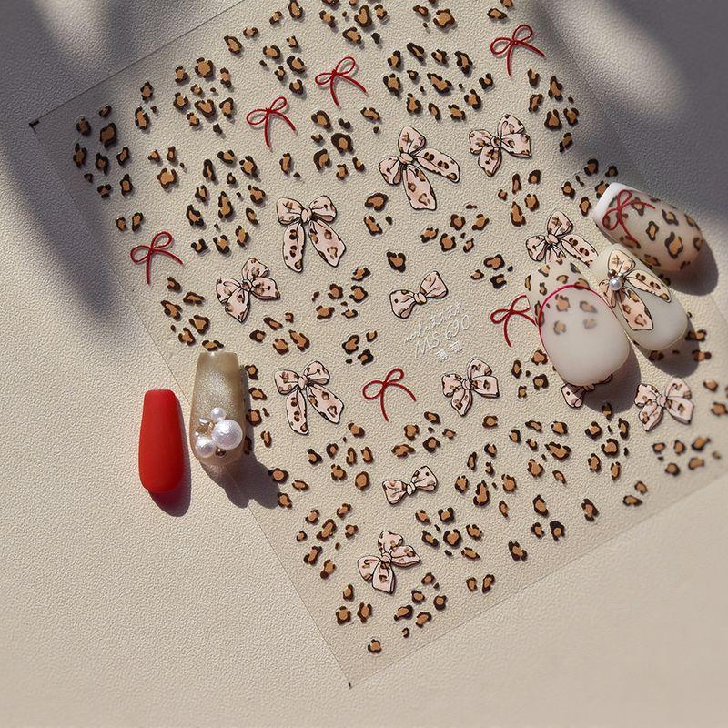 

INS Style Leopard Bow Nail Ornament Bright Crystal Nail Stickers New Shell Light [Send Tweezers]] Wild Leopard Print