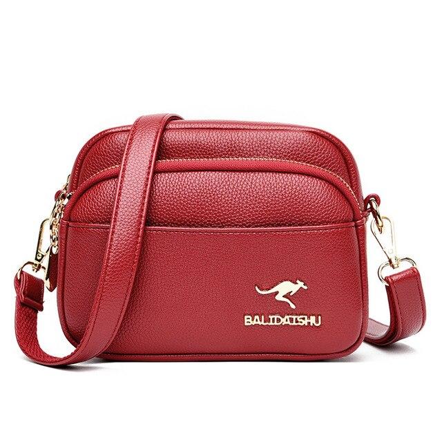 zippered crossbody bolsa