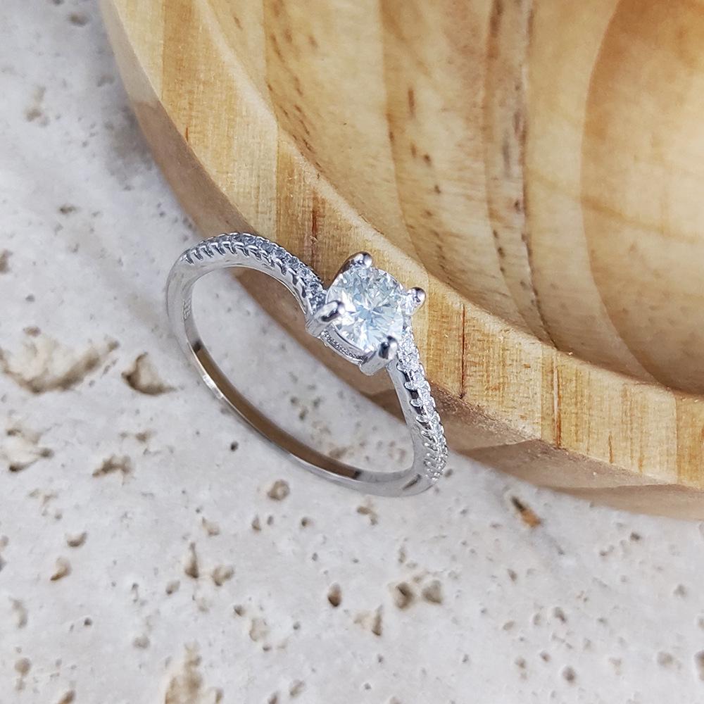 S925 Sterling Silver 50-Point Twisted Moissanite Ring with Four-Prong Setting