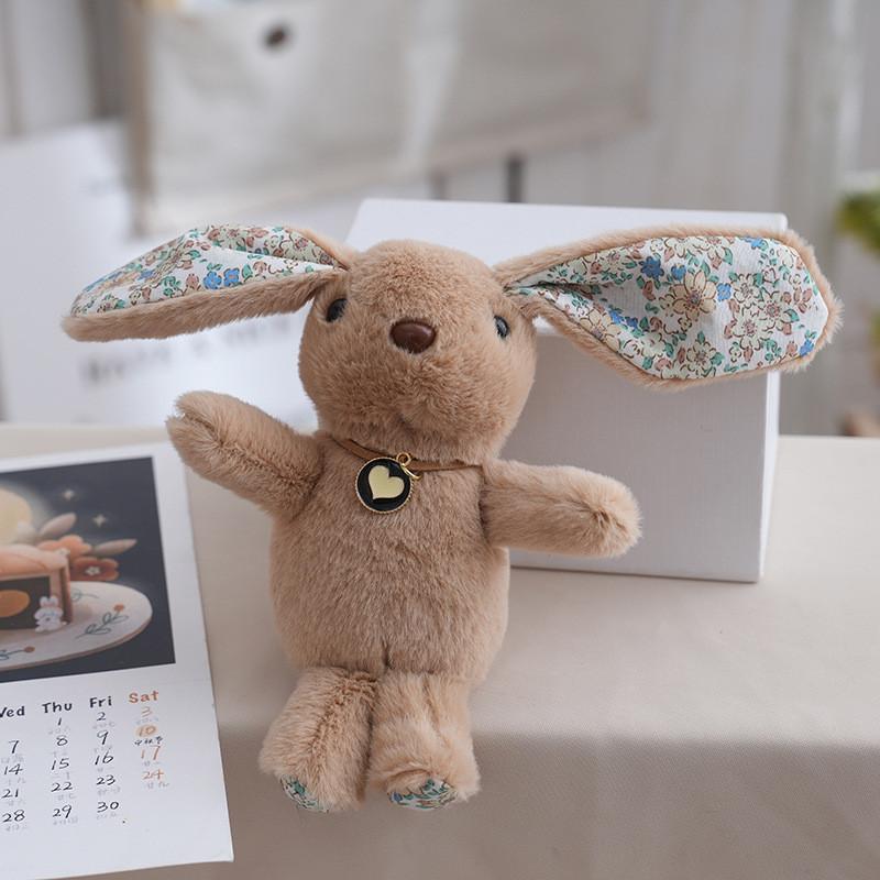 Rabbit Floral Cute Doll Designed With A Heartshaped Pendant For Holiday Present