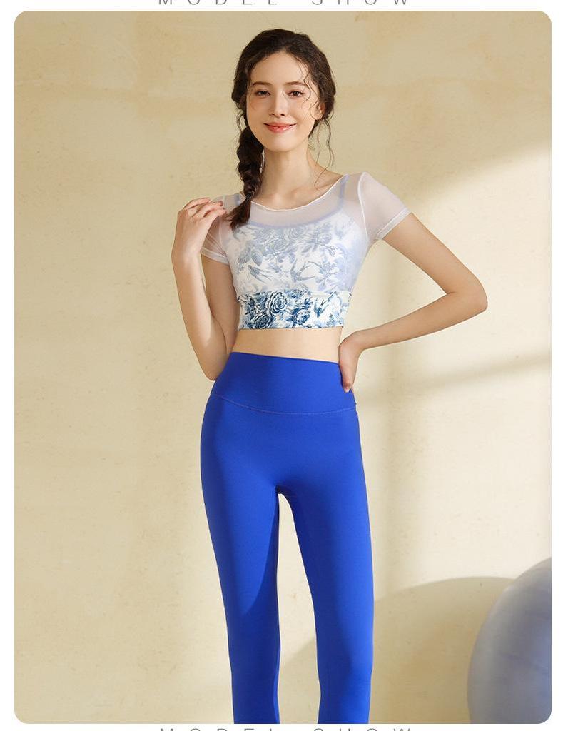 One-Shoulder Mesh Yoga Top with Chest Pads - Breathable, Hollow Design for Dance, Running, Fitness.