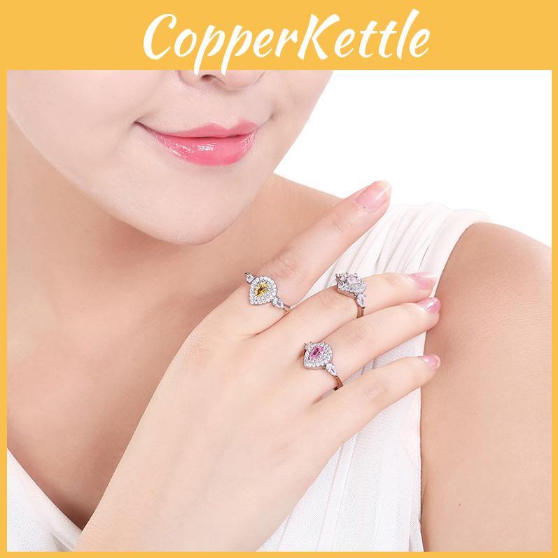 Luxurious Pink Diamond Womens Wedding Ring With A Stunning Teardrop Gemstone