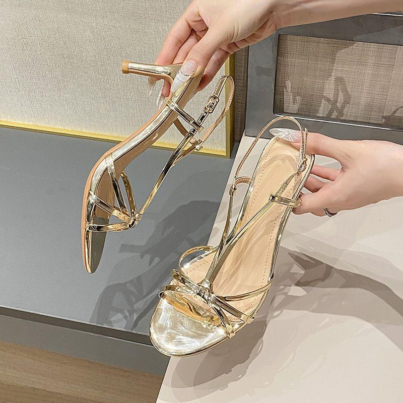Gold strap-on high heels for women's new summer transcendent one-word strap stiletto temperament socialite women open-toed sandals