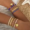 Bohemian Style Rice Bead Shell Multi-layer Bracelet Ethnic Wind Cord Woven Bracelet Four-piece Set