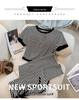 Women's Fashion Black Striped Summer Two-Piece Set: Casual Short-Sleeved Top and Wide-Leg Shorts