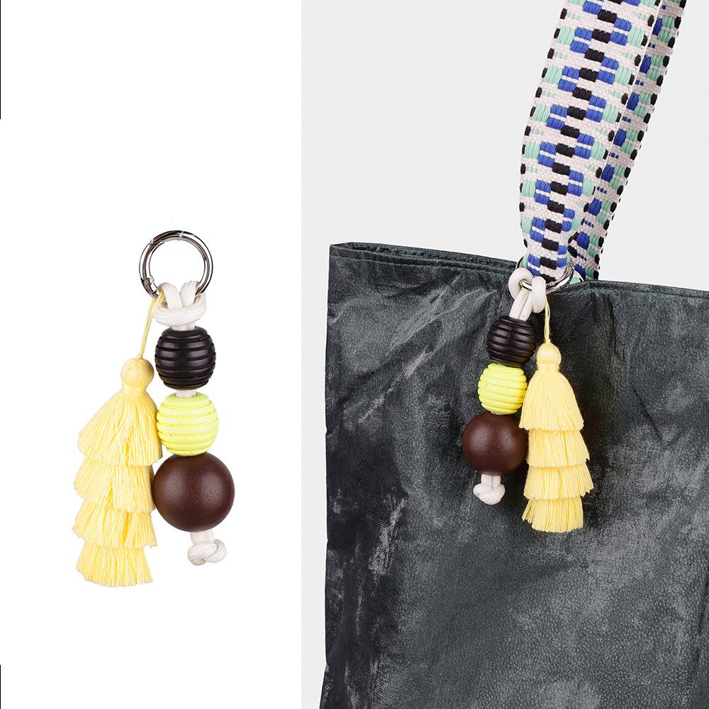 Hochwertiger Taschenanhänger mit niedlichem Ball und Dopamin-Quaste, fester Schlüsselanhänger-Zubehör, vielseitige kreative Mode-Serie