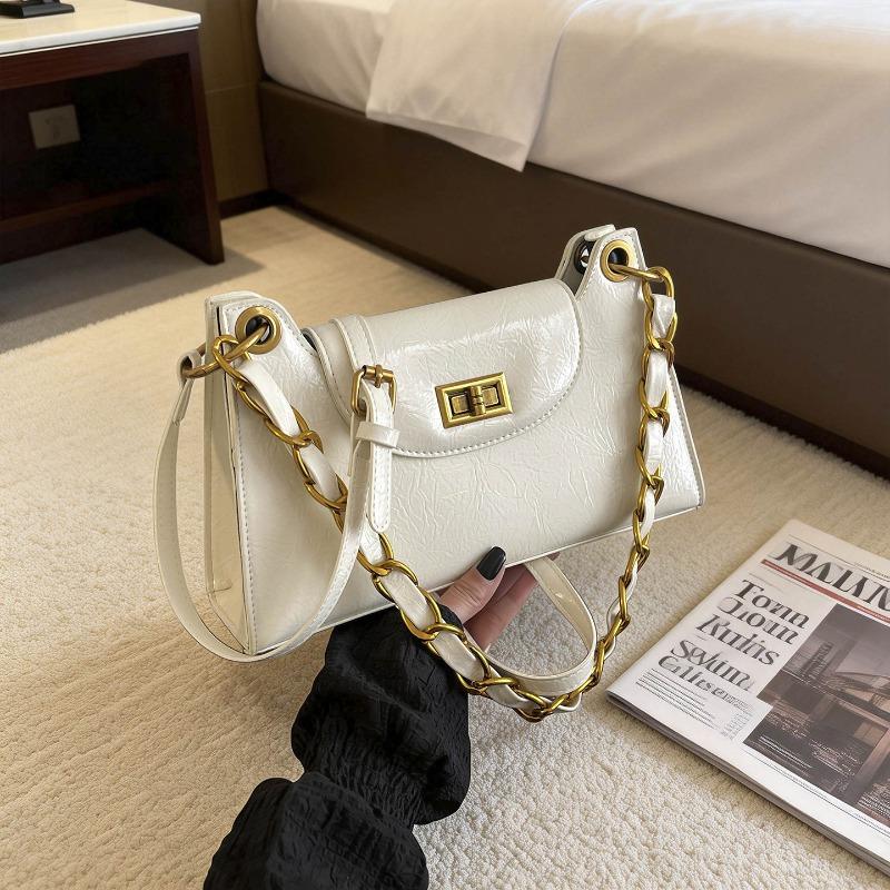 Retro simple new messenger bag spring and summer new women's shoulder bag commuter chain versatile portable