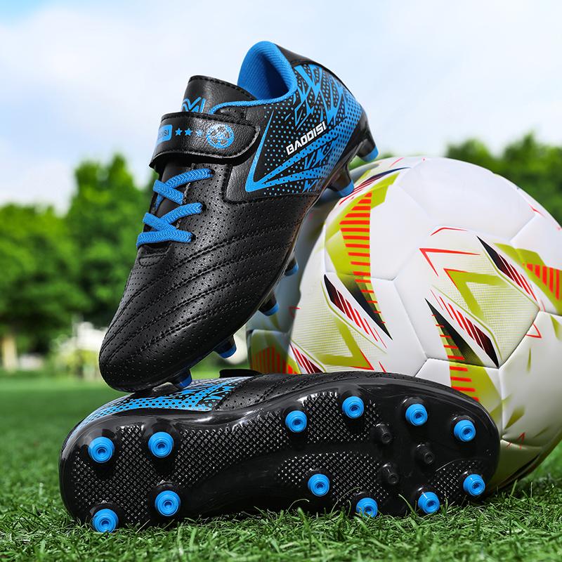 

A pair of Young Boys and girls four-season leather Soccer boots with long studs wear-resistant football shoes sizes 31-39 31