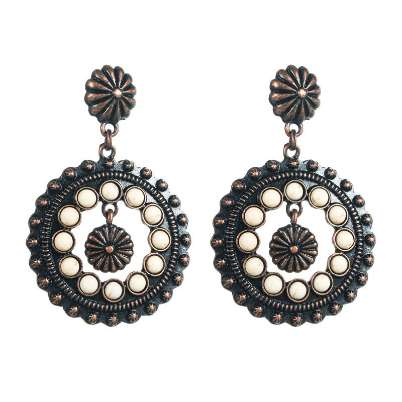 Retro Ethnic Style Earrings with Hollow Round Pendants and Exaggerated Party-style Ear Accessories