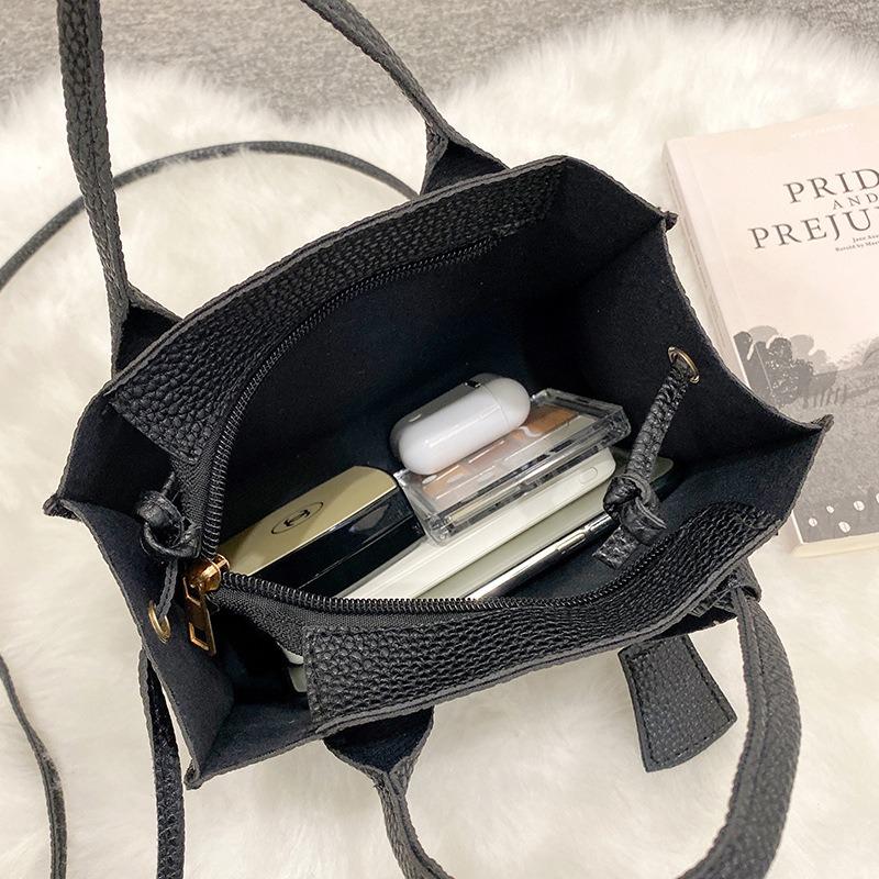 Frühling und Sommer neue Tragetasche mit Litschi-Muster, einfache Umhängetasche, lässige Handytasche zum Umhängen.