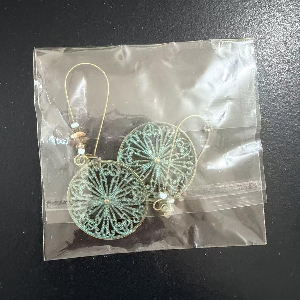 European and American bohemian style hollow pattern round brand earrings, retro bronze turquoise beaded women's earrings