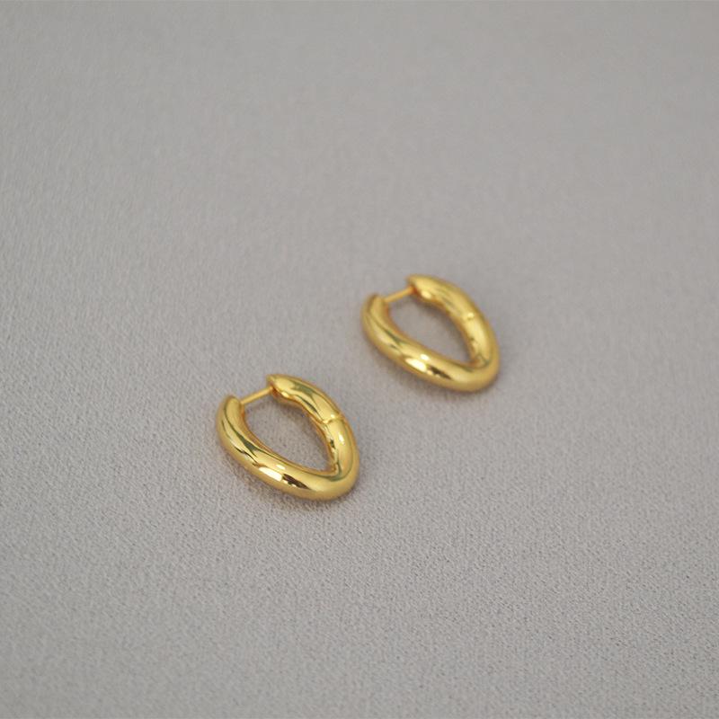 

Glossy Gold-Plated Brass U-Shaped Minimalist Earrings: Chic French Design
