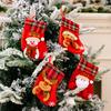 Decorative Red Christmas Stockings With Fun Cartoon Designs Of Santa Snowman Reindeer Bear For Vibrant Celebrations Festive