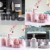 Plastic Bathroom Set With Grid Pattern Includes Soap Dispenser Shampoo Bottle And Storage Jars For Home Use