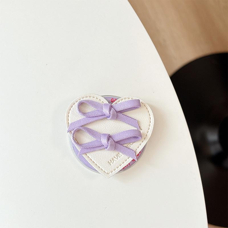 

Bow Cortex Love Mobile Phone Airbag Bracket Magnetic Desktop Bracket Simple Niche