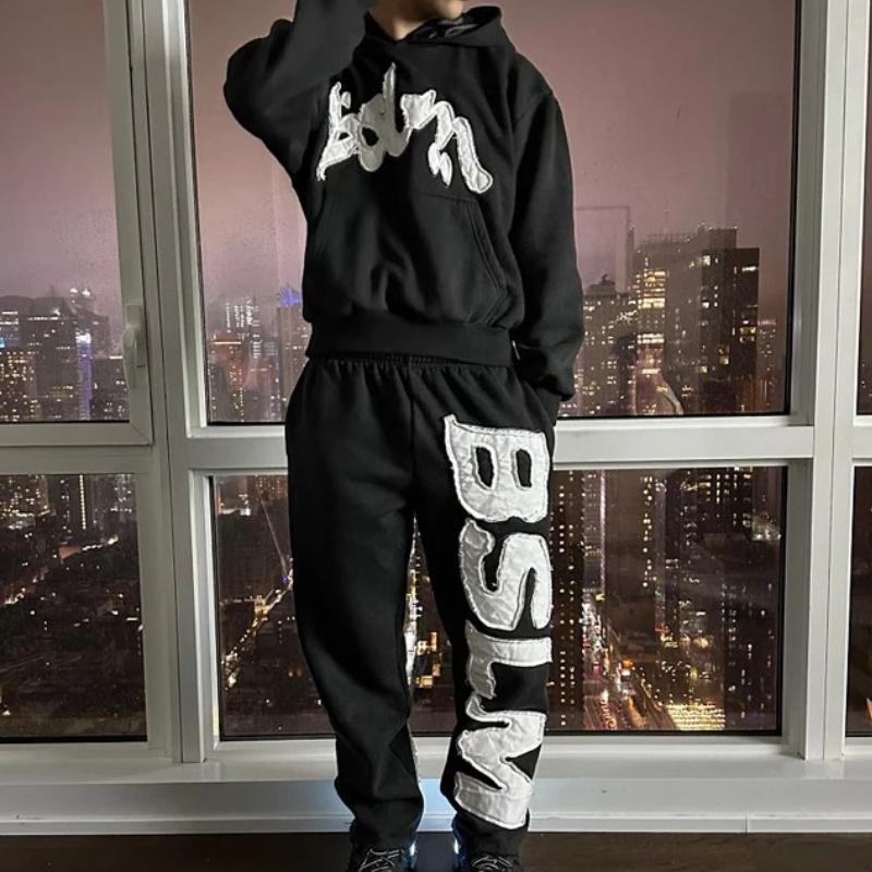 Pantaloni casual alla moda personalizzati street hip-hop con ricamo di lettere autunnali e invernali europei e americani per uomo e donna