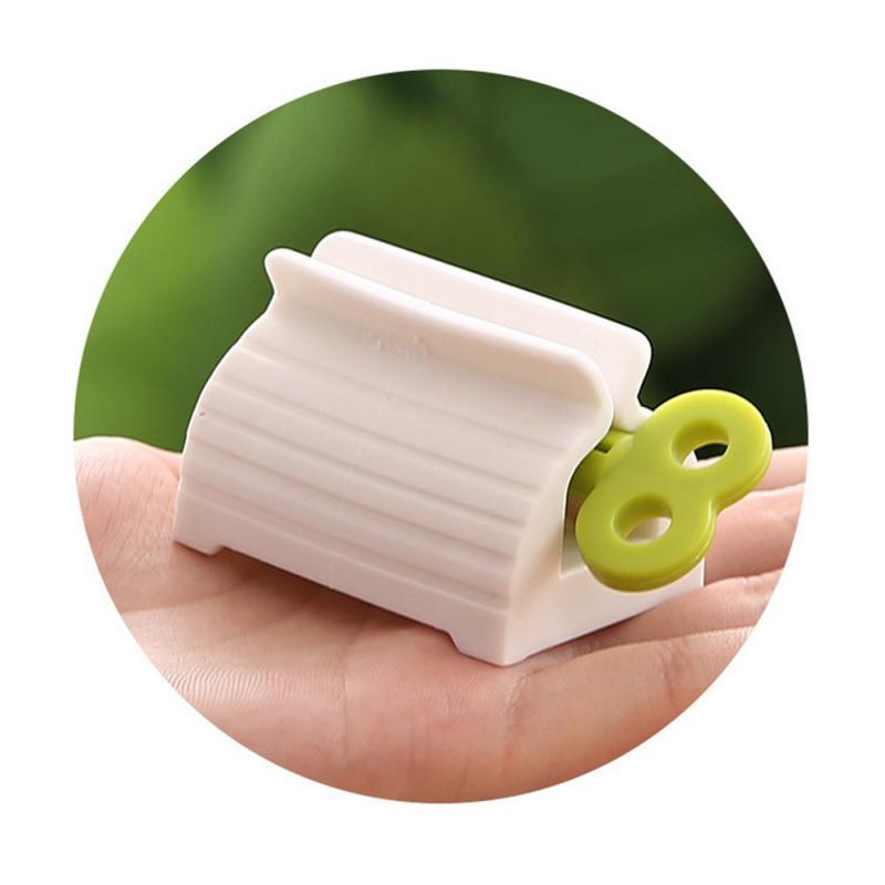 

Toothpaste Squeezer Tooth Paste Holder Oral Care Bathroom Tools Tube Cosmetics Press Facial Cleanser Rolling Squeezing