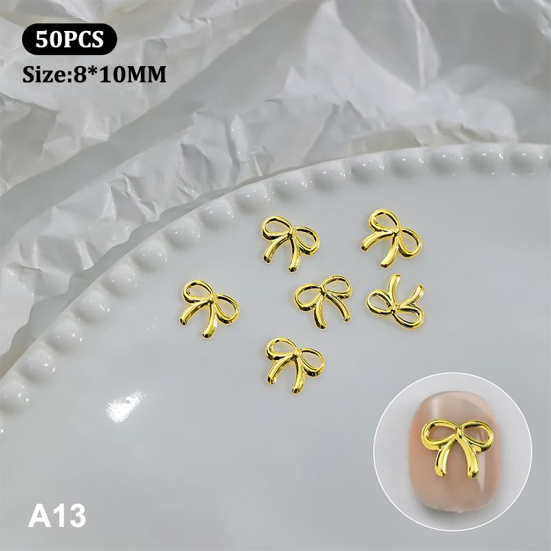 50 st Metalllegering Rosett Naglar Konst Dekoration Silver Guld Nagelberlocker DIY Manikyr Design Smyckestillbehör Verktyg