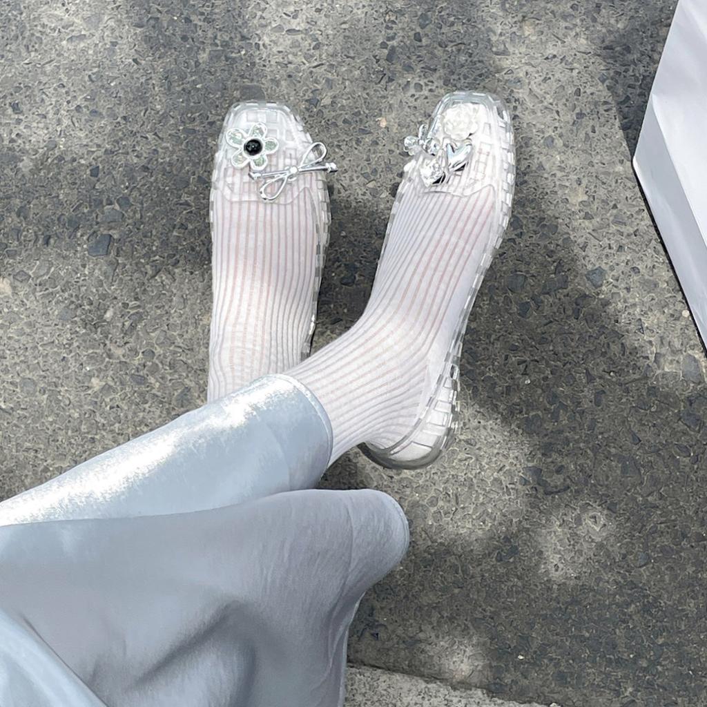 Retro popular black flat-bottomed bag head sandals women's 2025 new summer high-end Korean version crystal jelly shoes