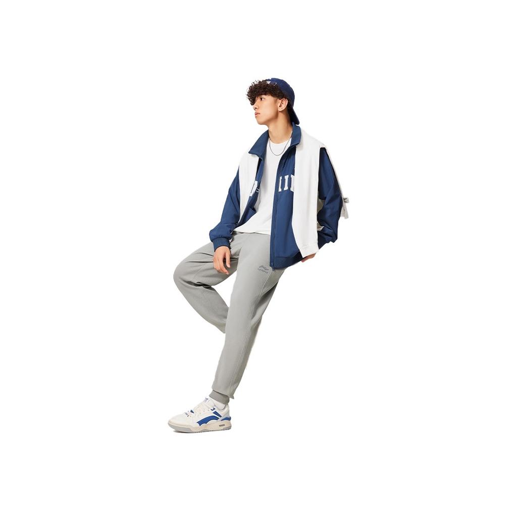 Li Ning Logo Breathable Comfortable Ice Feel Student Versatile Letter Running Basketball Casual Tapered Lace-Up Sports Pants Unisex pants ASCT164-1