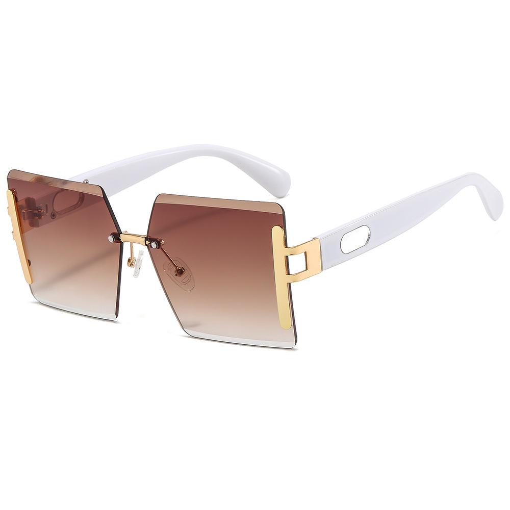 

New fashion unisex large-frame sunglasses personality rimless trim ocean sunglasses glasses