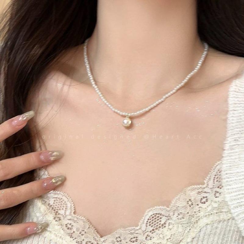 Elegant temperament shell pearl necklace women's versatile exquisite gentle wind millet bead collarbone chain neck chain new accessories